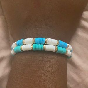 green and white bracelet, blue and white bracelet